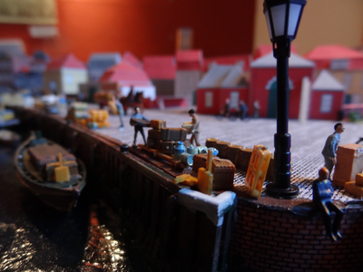 878194 Detail van de maquette van het noordoostelijk deel van ‘Wijk C anno 1925’, gemaakt door stagiaires van het ...